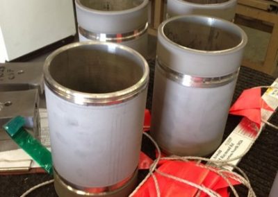 Tungsten carbide coated pump sleeves