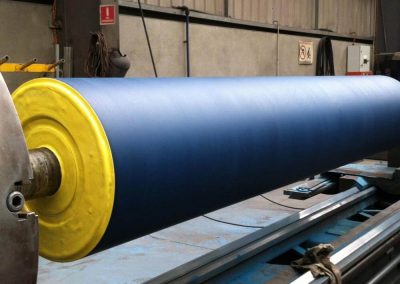 Paper industry wire drive roll polyurethane coating
