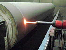 HVOF spraying tungsten carbide on a paper roller