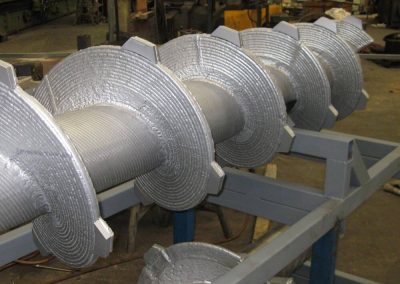 Robotically welded screw hardfacing