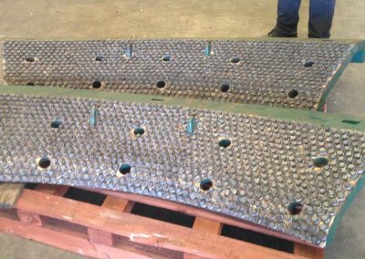 AbrasaStud lining of crusher wear plates