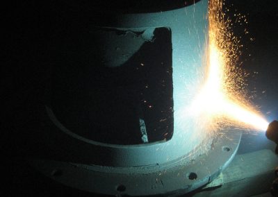 Vacuum pumps repaired using metal spray and hardfacing