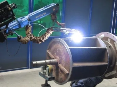 Rotary Valve Rotor being robotically hardfaced with PTA Welding